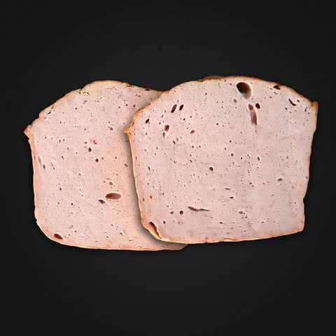 Leberkäse (2 Scheiben) vom Wurstschmied, frisch aufgeschnitten und verzehrfertig.