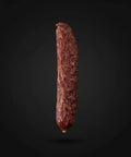 Handwurst auf schwarzem Hintergrund